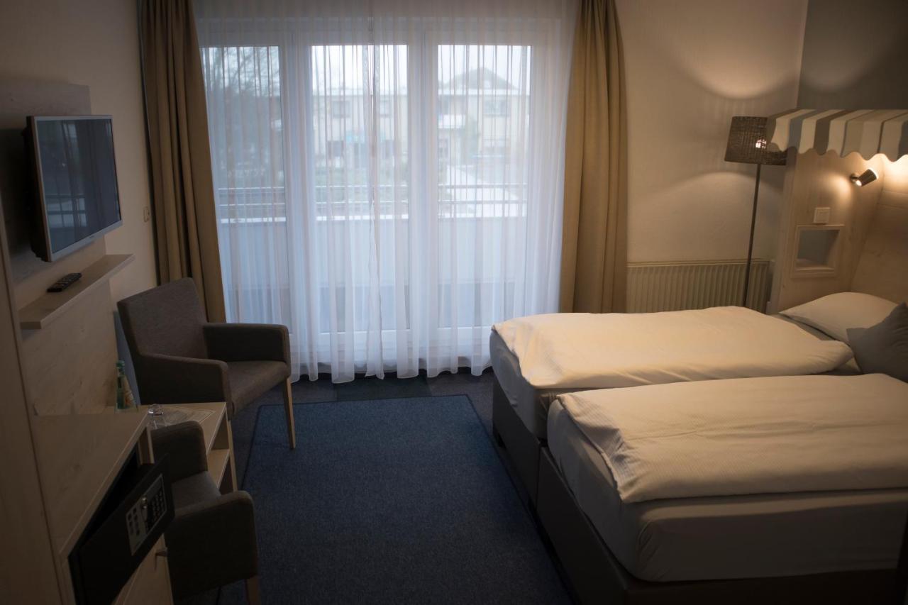 Hotel Am Friesenstrand Tossens Esterno foto